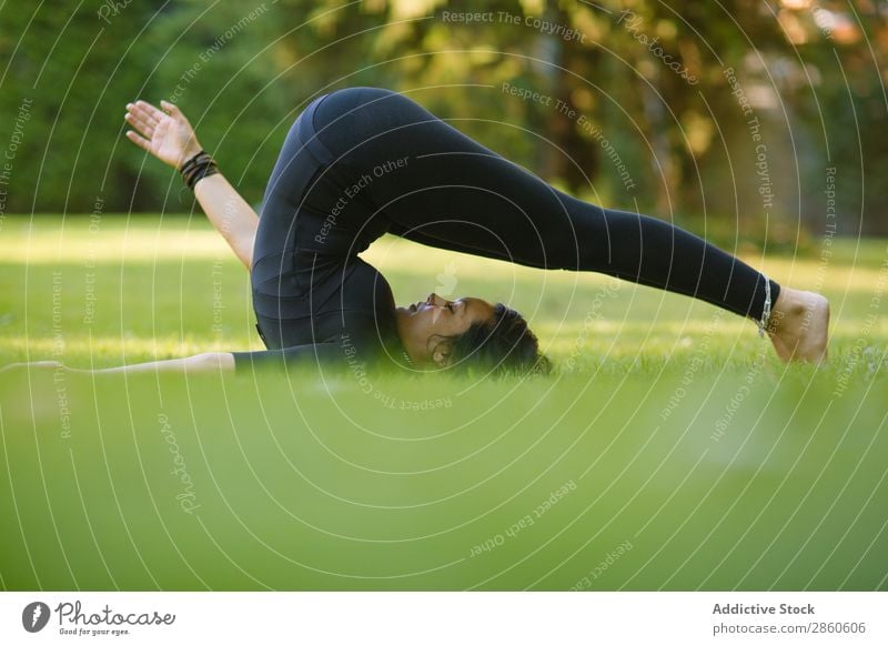 Young woman practicing yoga outdoors Action Loneliness asana Balance Beautiful Brunette Day Woman Fitness Girl Green Plant Healthy Lifestyle Meditation Nature