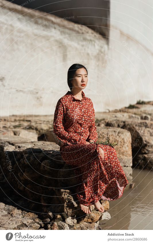 Pretty Asian woman sitting at pond Woman Youth (Young adults) Attractive Dress Red asian Japanese Sit Ground Pond Considerate Looking away Beautiful