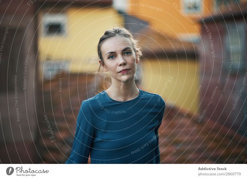 Woman standing at handrail in city pretty Youth (Young adults) Stand Handrail Lean Roof Town Think Pensive Beautiful Attractive Human being Beauty Photography