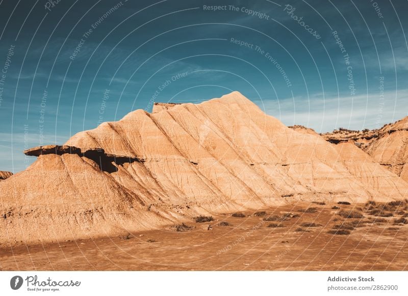 Desert cliffs under blue sky in landscape Cliff Canyon Picturesque Sand Landscape Panorama (Format) Blue sky Dry Valley Vacation & Travel Idyll Wild terrain