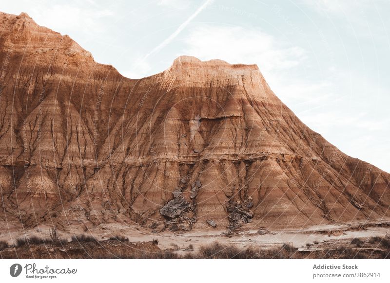 Picturesque sandy cliffs in sunlight Sandstone Cliff Landscape Dry Canyon Nature Rock Summer Blue sky scenery Adventure Panorama (Format) Peace