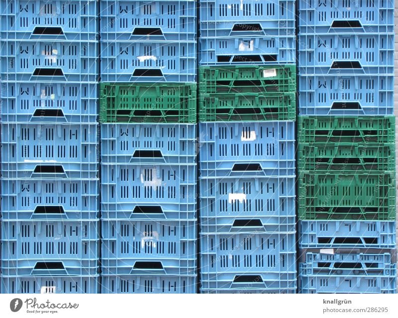 confidence man Box of fruit Plastic basket transport box Stand Sharp-edged Tall Town Blue Green Emotions Orderliness Arrangement Symmetry Logistics Stack Crate