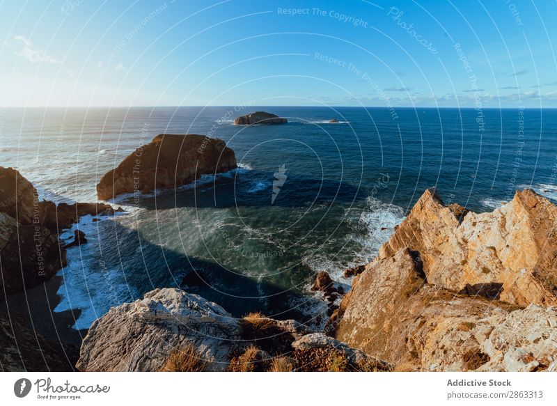 High cliff near water in sunny day Cliff Water Ocean cabo de penas asturias Spain Hill Stone Height Beautiful weather Top Picturesque Sun Landscape Coast Blue