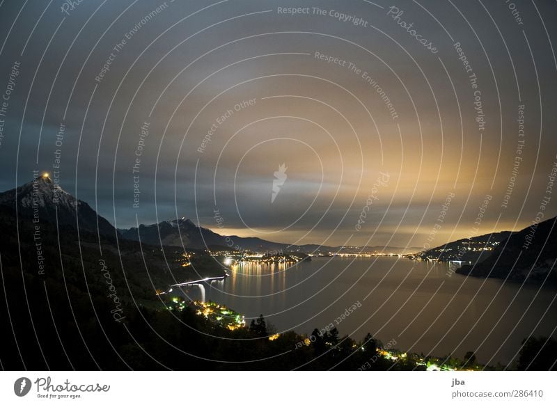 Lake Thun II Mountain Landscape Elements Air Water Sky Night sky Horizon Lakeside Traffic infrastructure Movement Dark Bernese Oberland Strip of light