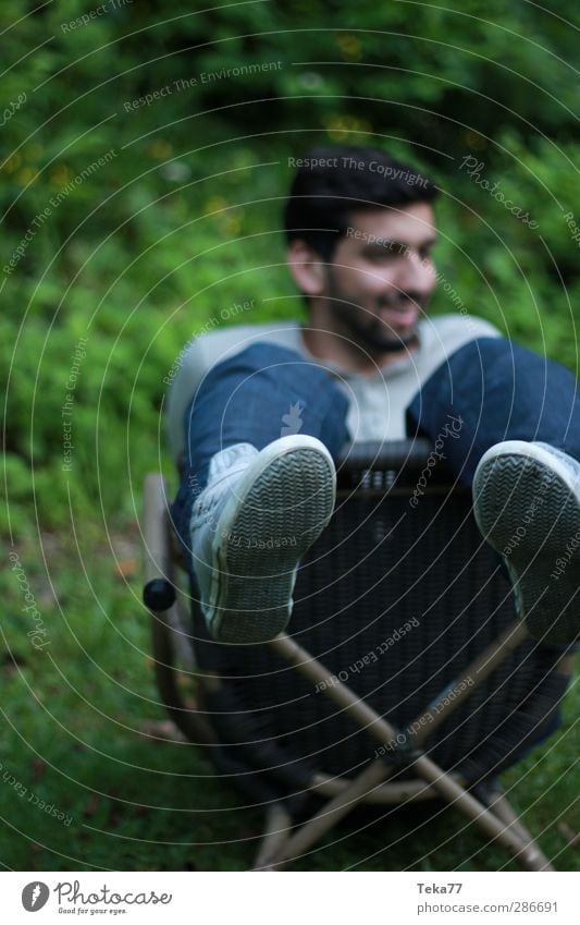 in the garden Human being Masculine Young man Youth (Young adults) Life 1 18 - 30 years Adults Environment Nature Summer Grass Bushes Garden Joy Happy Happiness