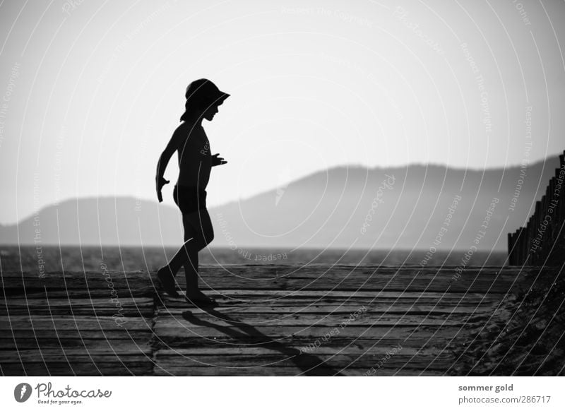 backlight Vacation & Travel Summer Summer vacation Beach Ocean Human being Child Boy (child) Infancy 1 3 - 8 years Sky Beautiful weather Giens France Village