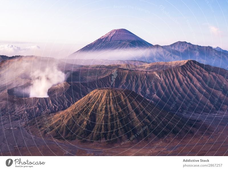 Amazing view of high mountains and blue sky Mountain Volcano Sky Clouds mount bromo java island Indonesia Picturesque Vantage point Blue Height Heaven Landscape