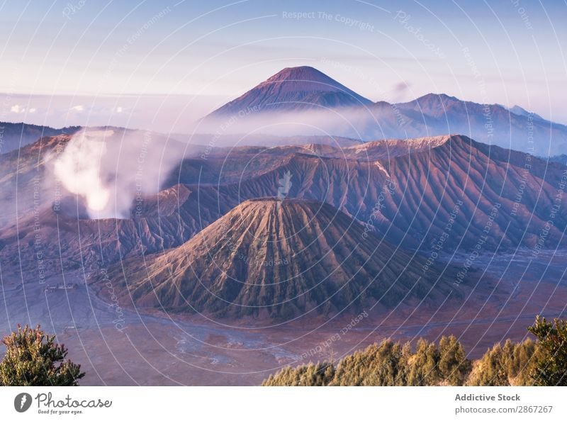 Amazing view of high mountains and blue sky Mountain Volcano Sky Clouds mount bromo java island Indonesia Picturesque Vantage point Blue Height Heaven Landscape