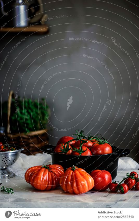 Ripe fresh tomatoes in pot on table Tomato Pot Table Red Mature Form (document) Fresh big Exceptional Wall (building) Gray Food Vegetable Meal Rustic Healthy