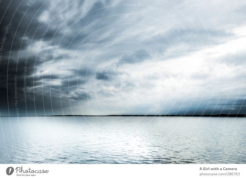 Hiddensee - the crossing Environment Nature Landscape Elements Water Sky Clouds Storm clouds Spring Bad weather Dark Natural Wild Blue Far-off places