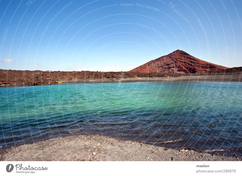 fantasy land Landscape Earth Sand Sky Cloudless sky Horizon Winter Beautiful weather Hill Rock Volcano Coast Beach Bay Lake Desert Blue Green Red Sparse