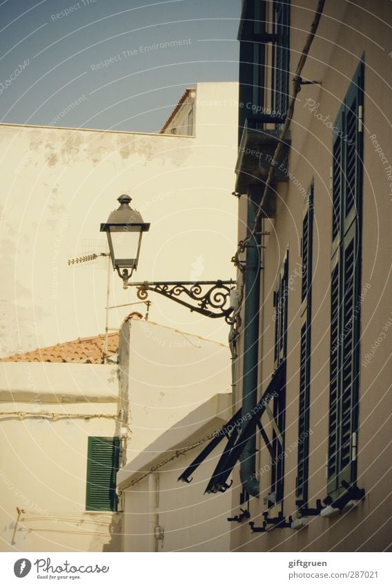 Lantern II House (Residential Structure) Facade Window Bright Street lighting Lighting Shutter Curlicue White Sky Southern Europe Old Old town Italy Closed