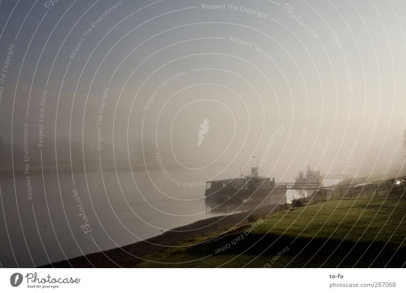 Elbe in the morning Environment Landscape Water Sky Autumn Fog River bank Inland navigation Ferry Watercraft Shipyard Moody Morning fog Haze Colour photo