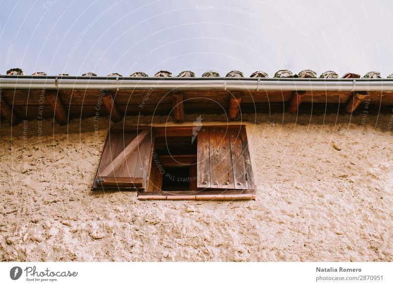 The facade of a rural house with a wooden window half open Beautiful Vacation & Travel House (Residential Structure) Garden Decoration Culture Nature Landscape