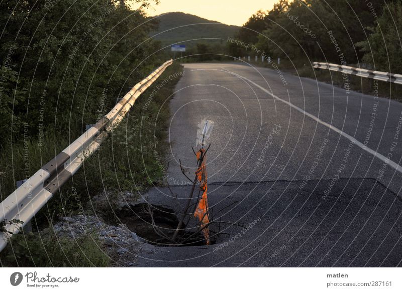 holes Sunrise Sunset Summer Beautiful weather Road traffic Street Gray Red Pothole Warn Bottle Stick Crash barrier alert Asphalt no passing Through crimpy