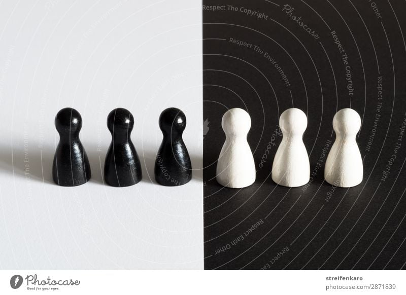 Black game pieces on white background face white game pieces on black background Group Toys Piece Wood Observe White Acceptance Together Solidarity Tolerant