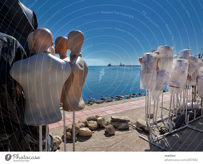 sunbath Head Group Coast Ocean Deserted Bald or shaved head Stone Wait Blue White Doll Pillar pier tarpaulin sunbathe Colour photo Exterior shot Copy Space top