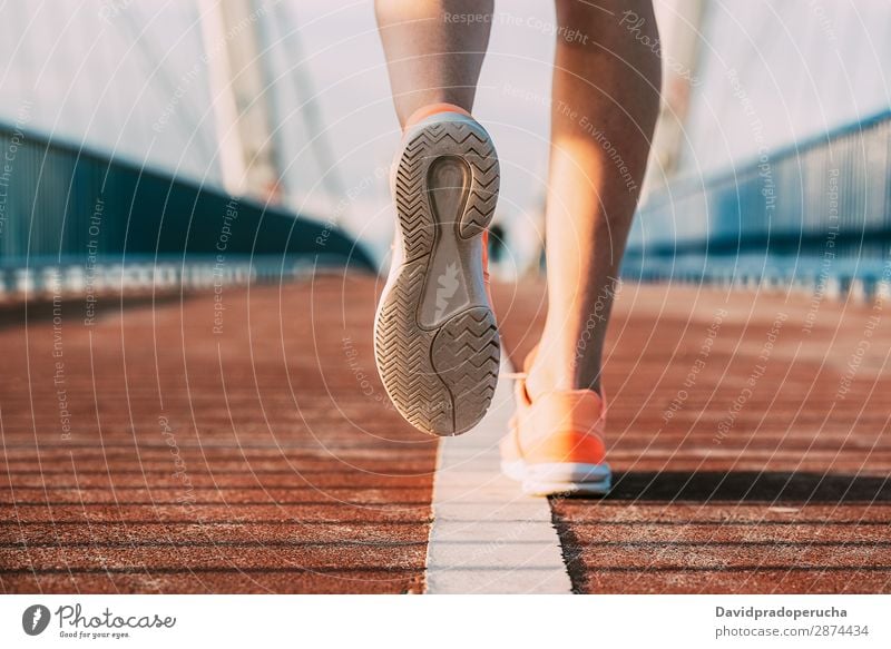 crop woman running on the bridge working out Crops Partially visible Legs Sneakers healthy lifestyle Lifestyle Athletic Fitness Healthy Jogging Running work out