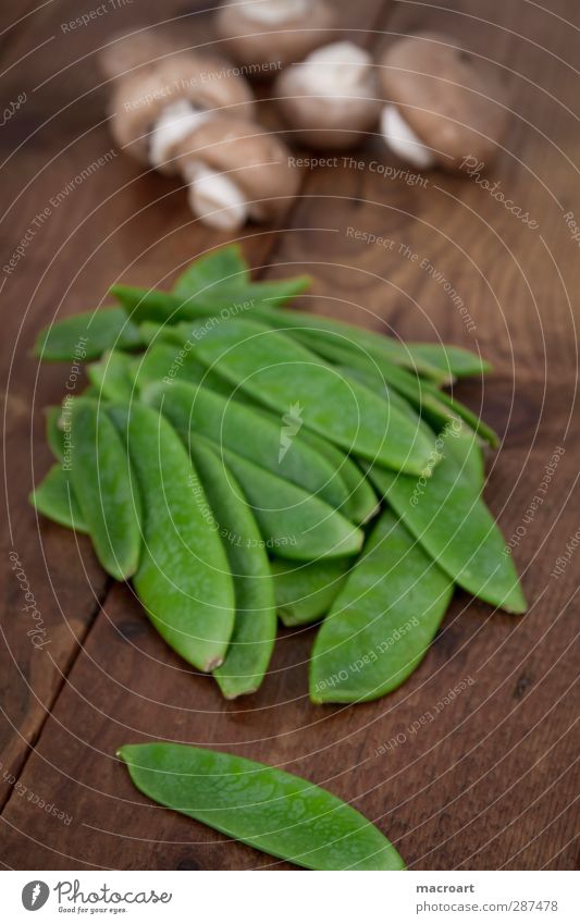 Mushrooms and sugar snap peas Sugar peas Peas Legume Button mushroom Raw Ingredients Cooking Vegetable Wood Wooden table Fresh Nutrition Green