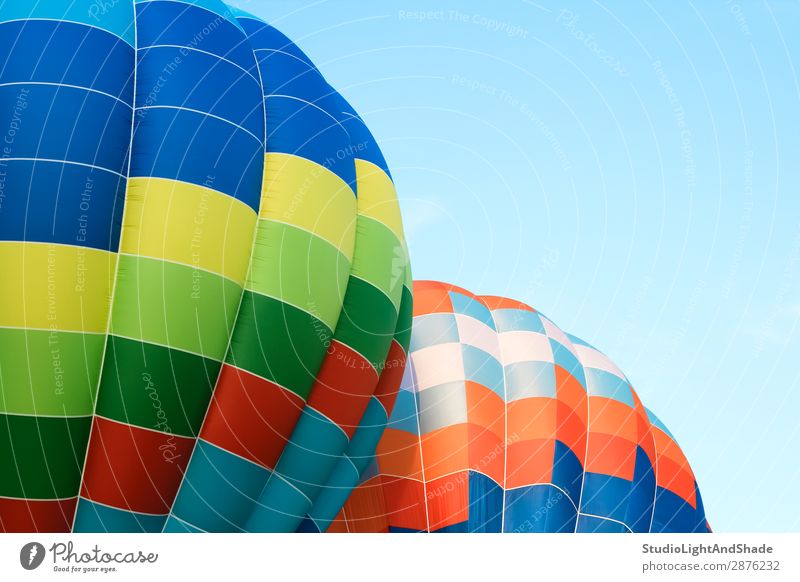 Closeup of multicolored hot air balloons Joy Leisure and hobbies Vacation & Travel Adventure Freedom Sports Sky Transport Aircraft Hot Air Balloon Flying Bright