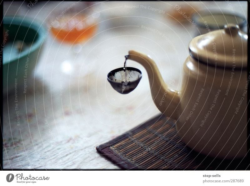 collecting device Food To have a coffee Slow food Beverage Hot drink Tea Warm-heartedness Purity Whimsical Teapot Tea strainer Catch Filter Kitchen Table