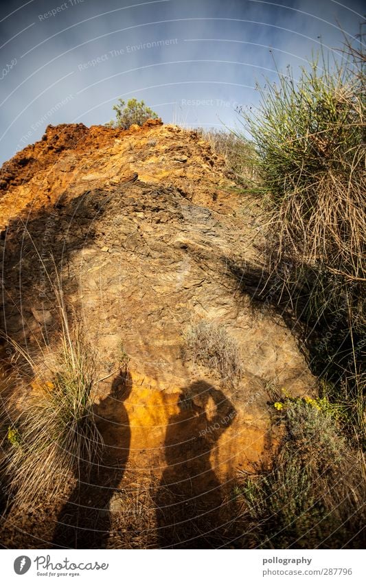 Iron hat & inspiring geologists Human being 2 Environment Nature Landscape Plant Earth Sand Sky Clouds Summer Beautiful weather Grass Bushes Rock Rock formation