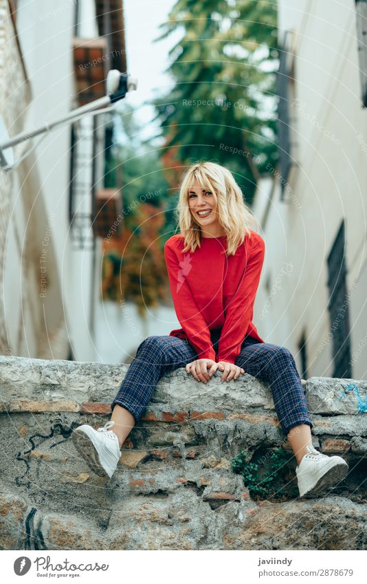 Smiling blonde girl with red shirt enjoying life outdoors. Lifestyle Style Happy Beautiful Hair and hairstyles Human being Feminine Young woman