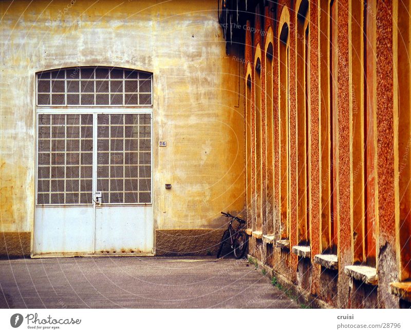 company gate Italy Lake Garda Warehouse Physics Multicoloured Warm colour Europe Gate Company Warmth Architecture