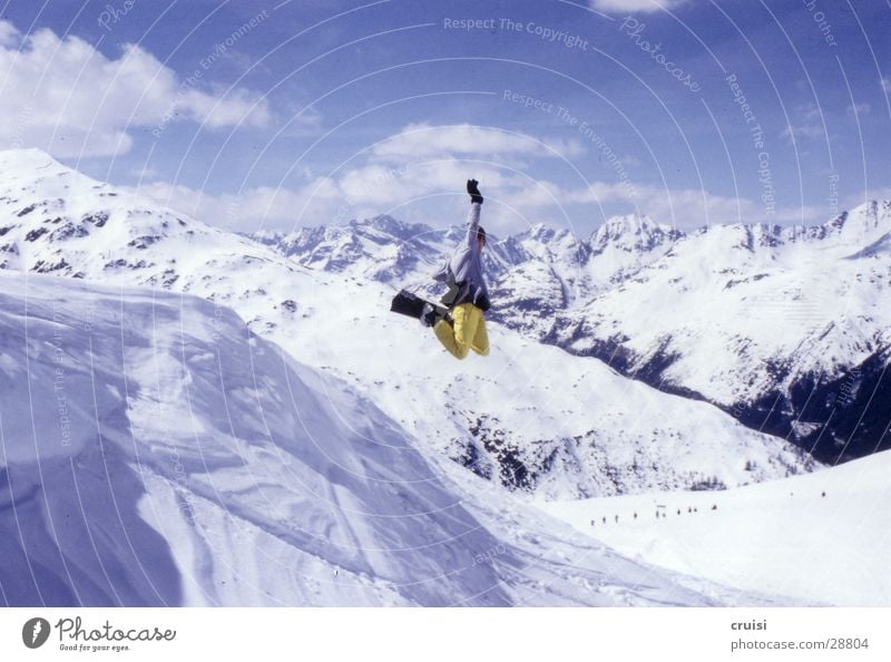 air Saint Jakob Deep snow Jump Backside air Snowboard Sports Snowboarder Snowboarding Freestyle Trick Posture Talented Snowcapped peak Snowscape Winter mood 1