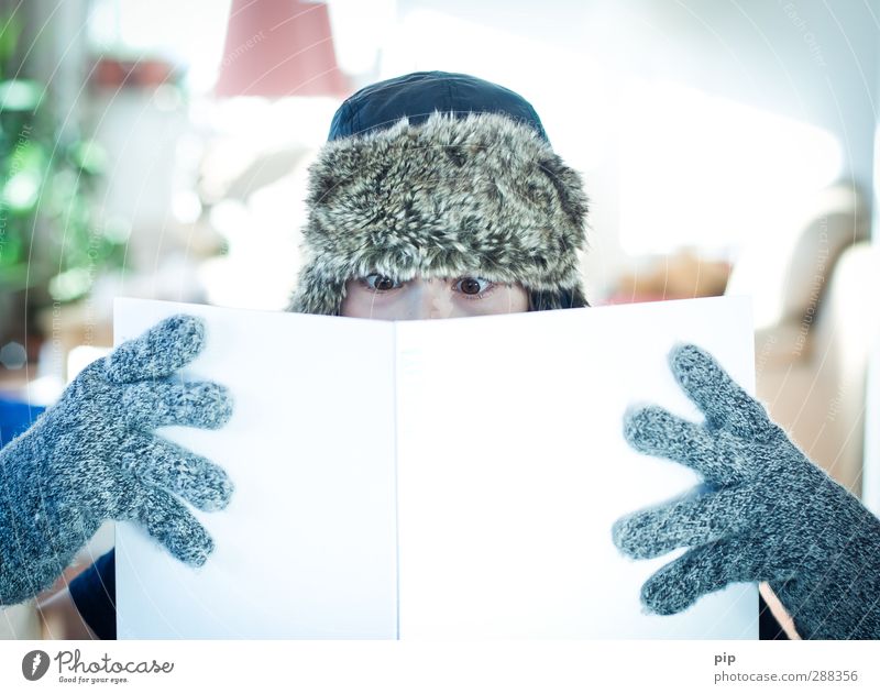 reading is cool Reading Human being Masculine Boy (child) Eyes Fingers 1 Gloves Cap Book Study Education Literature Exciting Shackled Gaze Booklet Cold