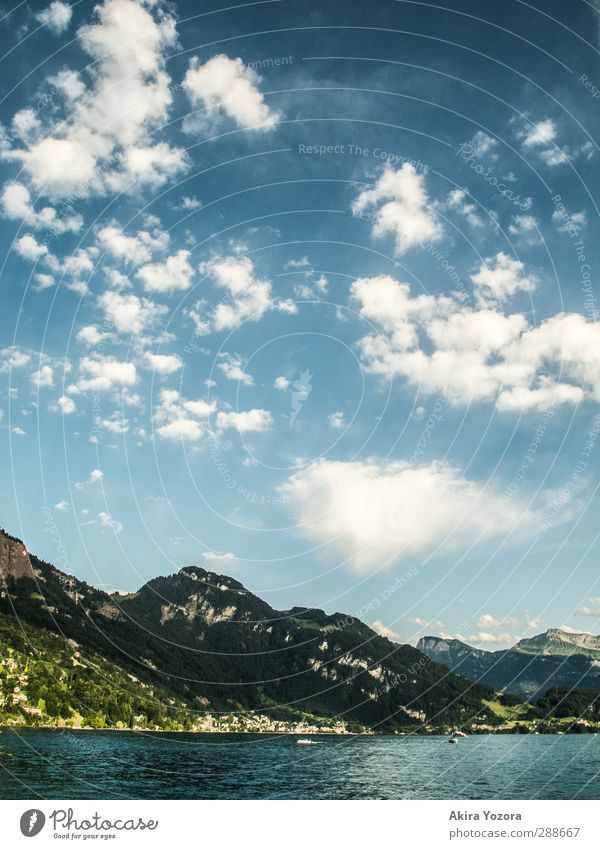 Where sky, mountains and water meet II Contentment Relaxation Vacation & Travel Summer Mountain Nature Landscape Air Water Sky Clouds Beautiful weather Alps