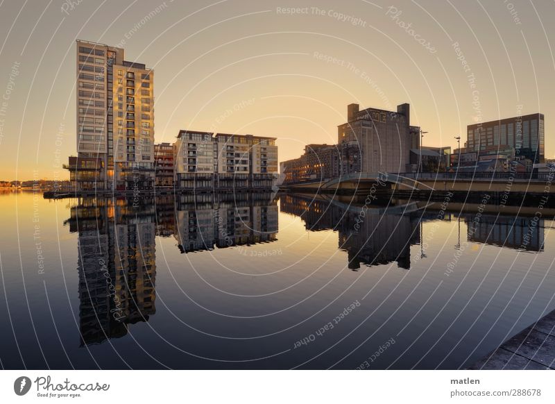 water level Water Sky Cloudless sky Sunrise Sunset Autumn Coast Town Port City Deserted House (Residential Structure) High-rise Bridge Building Architecture