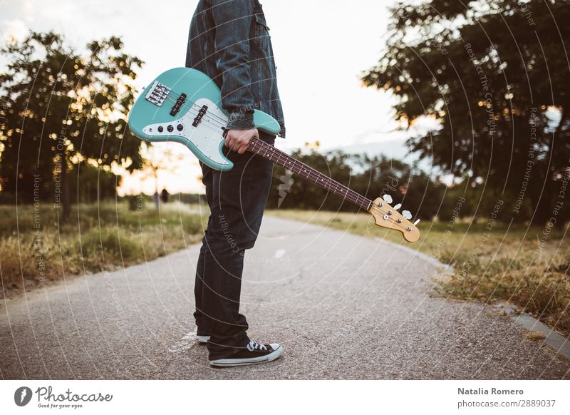 outdoor photo session with a bass player Playing Entertainment Music Human being Man Adults Concert Band Musician Guitar Nature Rock Black performer Jazz stage