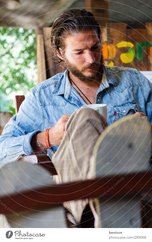 coffee break Man Human being Sit Table Chair Armchair Coffee Beverage Drinking Cellphone Playing SMS Write Reading Feet Put one's feet up Relaxation Break