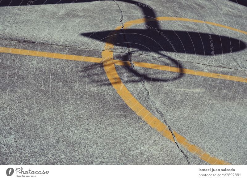 basketball shadow silhouette in the street Shadow Silhouette Basketball Sports Playing Abandon Old Street Park Playground Exterior shot Broken