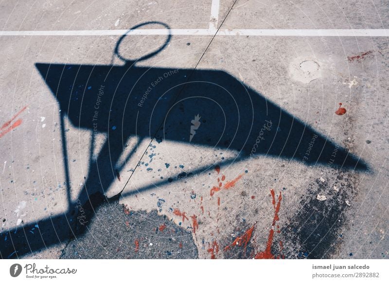 basketball sport and shadow in the street Basketball Shadow Silhouette Ground Playing field Story Sports Abandon Street Park Playground Exterior shot