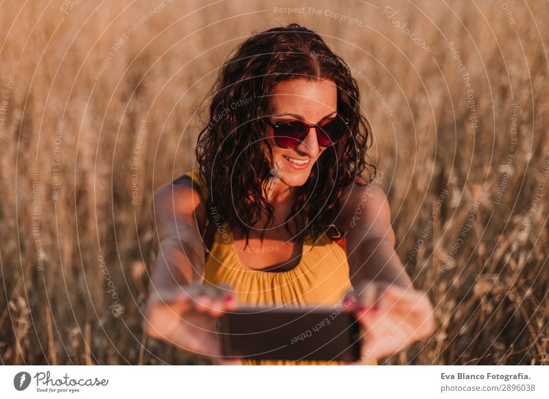 Young beautiful woman in yellow dress taking a selfie Lifestyle Happy Beautiful Body Vacation & Travel Summer Sun Telephone Technology Internet Human being