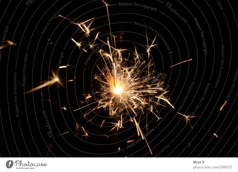 star lashers Feasts & Celebrations New Year's Eve Illuminate Hot Bright Gold Dangerous Fire Firecracker Star (Symbol) Sparkler star candle Ignite Colour photo