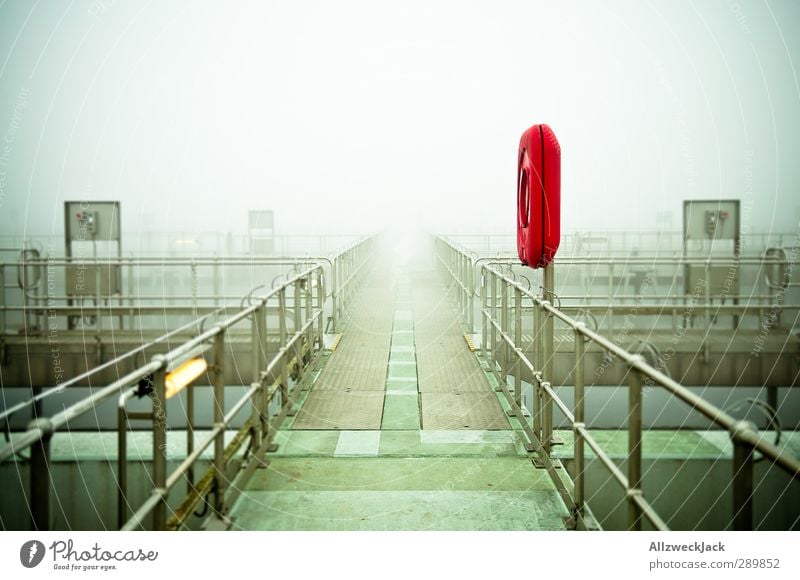 in the fog Industry Deserted Threat Gray Surrealism Footbridge Life belt Metalware Corridor Industrial plant Fog Shroud of fog Colour photo Exterior shot