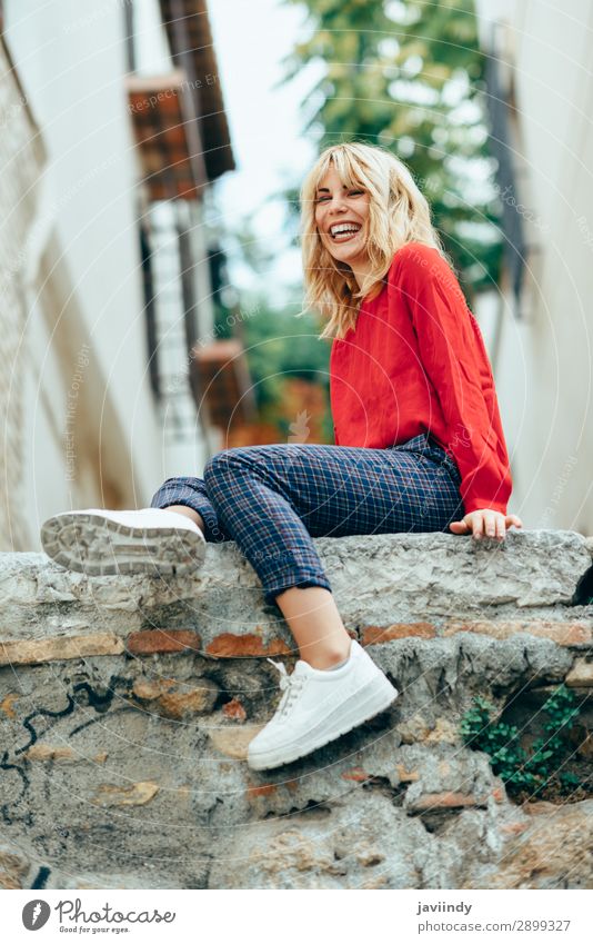 Smiling blonde girl with red shirt enjoying life outdoors. Lifestyle Style Happy Beautiful Hair and hairstyles Human being Feminine Young woman