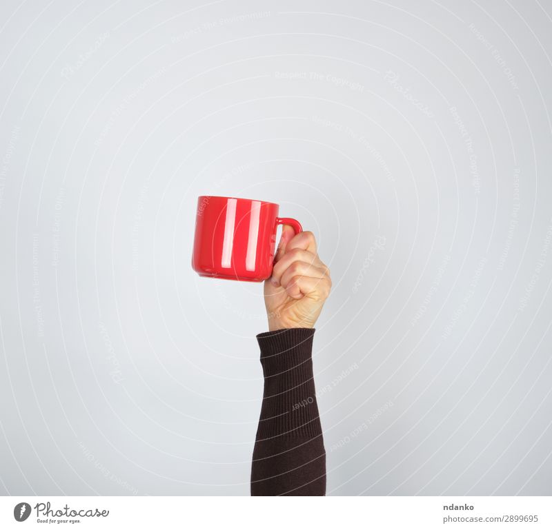 red ceramic cup in a female hand on a white background Breakfast Beverage Coffee Espresso Tea Cup Mug Woman Adults Hand 1 Human being 18 - 30 years