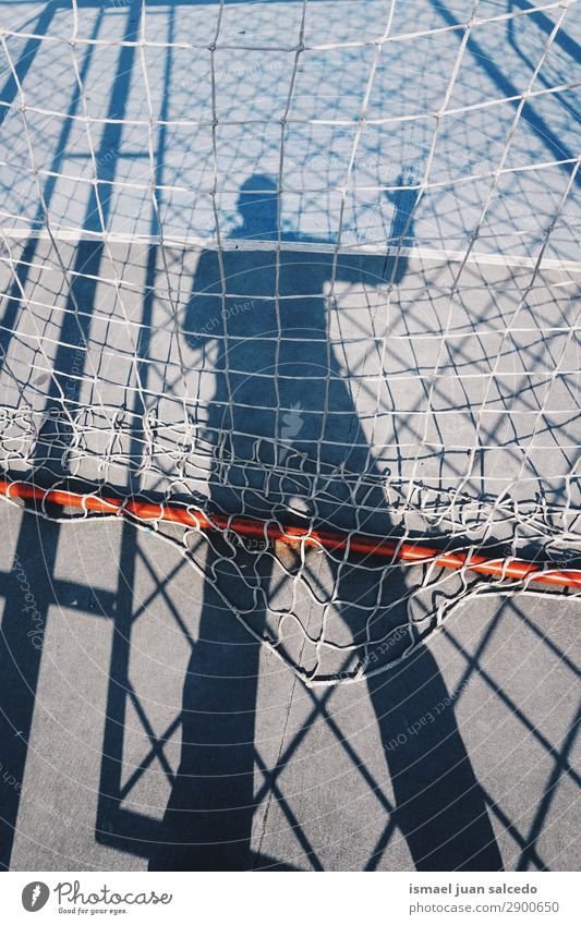 man shadow silhouette on the soccer field Silhouette Human being Man Shadow Light (Natural Phenomenon) Sun Street Soccer Sports Playing field Goal Ground