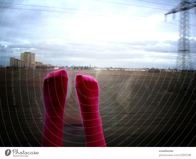 View from a moving train onto a flat landscape with a high-rise complex Energy industry High-rise Train travel Train compartment Tights Wanderlust Railroad