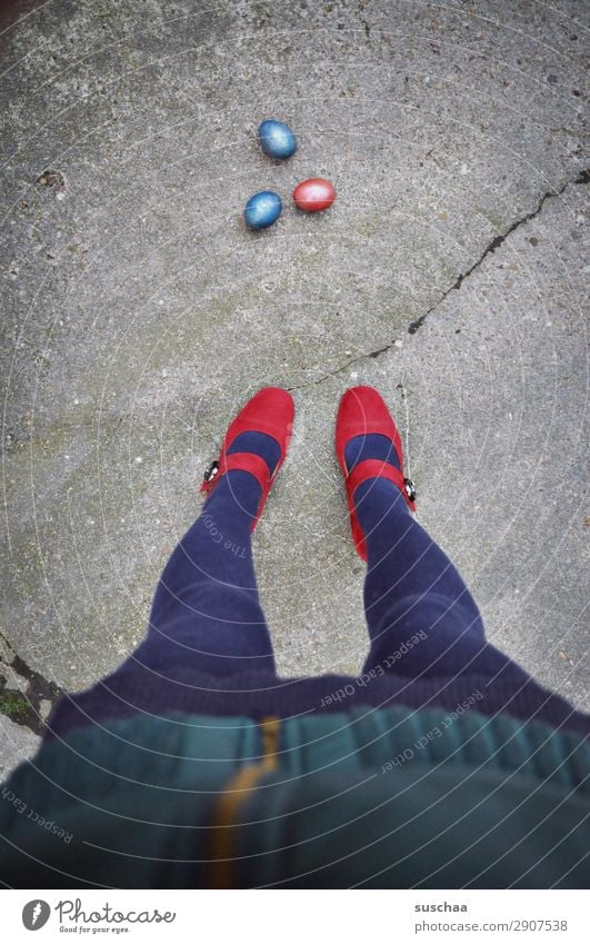 3 easter eggs on the street with legs Woman feminine Legs feet High heels Stand steady Tights Red Easter eggs Street Asphalt Crack & Rip & Tear Strange