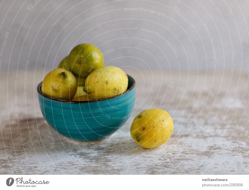 Still life with lemons Food Fruit Lemon Lime Nutrition Organic produce Vegetarian diet Bowl ceramic bowl Simple Fresh Delicious Sour Beautiful Blue Yellow Gray