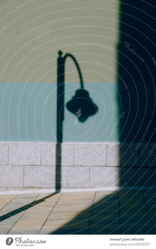 street light in the shadows Street lamp Street lighting Shadow Silhouette Lamp post Illumination City Lighting Metal Object photography Exterior shot