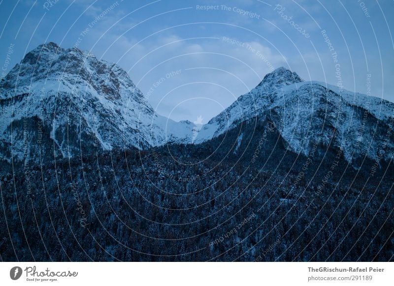 an island with two mountains.... :-) Environment Nature Landscape Sky Clouds Winter Weather Blue Brown Gray Green Black White Mountain Rock Snowfall Icing