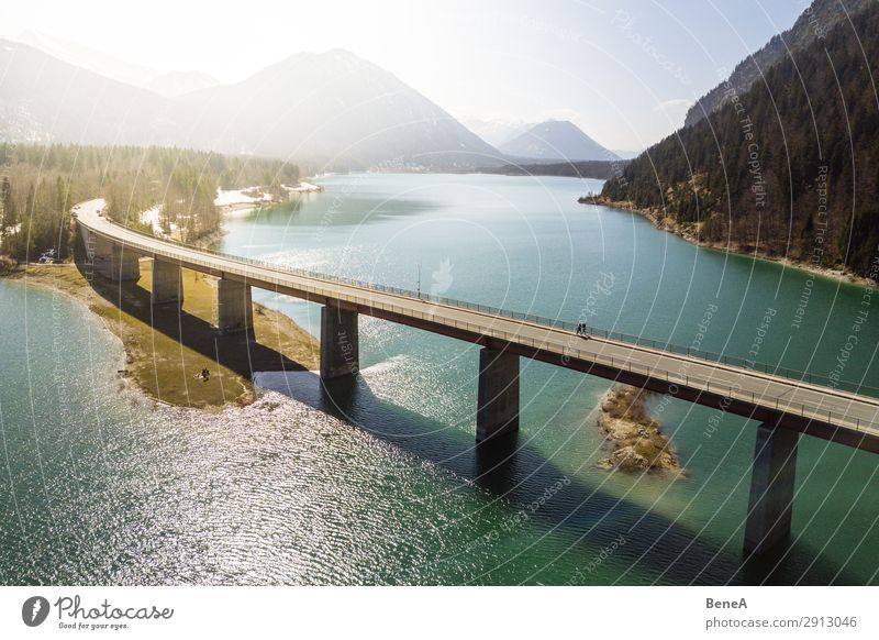 A bridge spanning a lake in the Bavarian Alps Aerial Air Beach Bend Bird's Eye View Bridge Dam Drone Forest Germany Green Lake Landmark Landscape Mountain