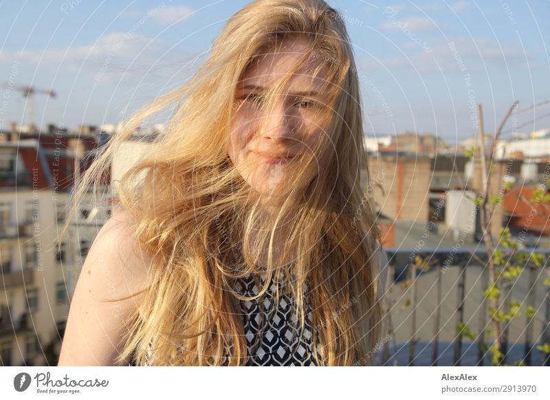 Blond girl with blowing hair on a roof terrace Style Joy Beautiful Hair and hairstyles Life Roof terrace Young woman Youth (Young adults) 13 - 18 years