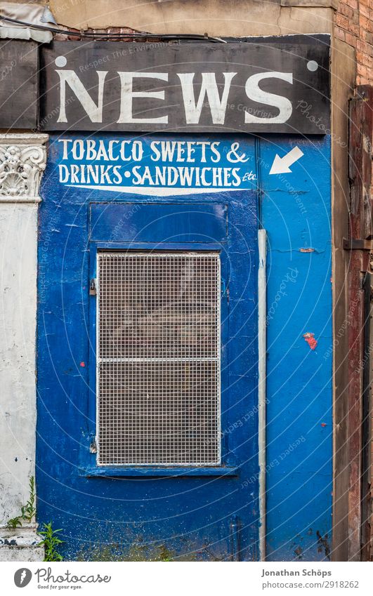 Facade retail shop kiosk Town Architecture Trade England Great Britain leeds Newspaper Tobacco Tobacco products Candy Beverage stall Store premises Kiosk